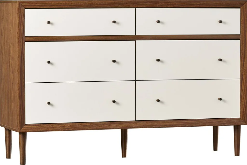 Wide double dresser with drawers, a lamp and a tray on top.