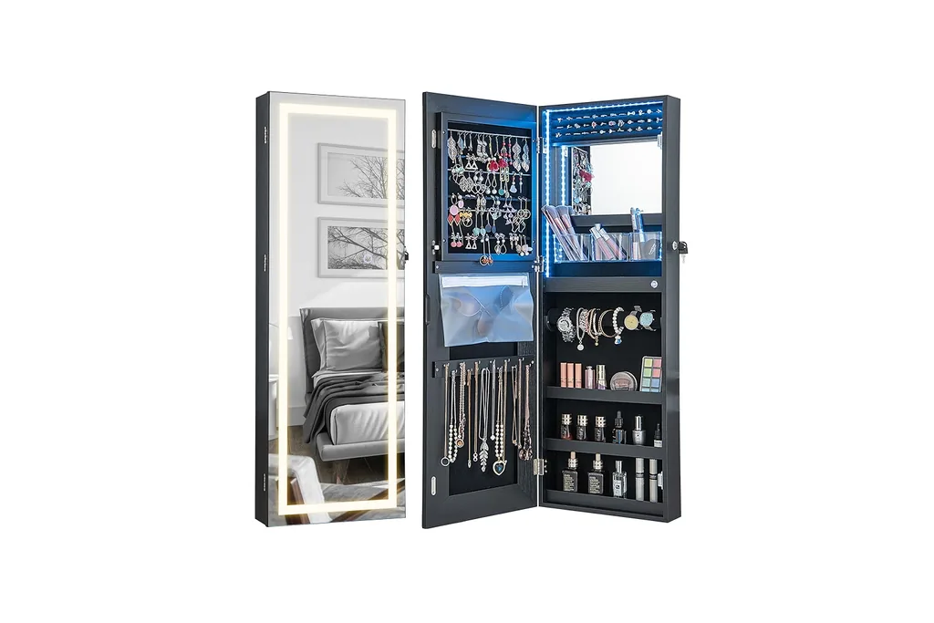 Wall mounted jewelry cabinet with a mirror, open to show necklaces on hooks.