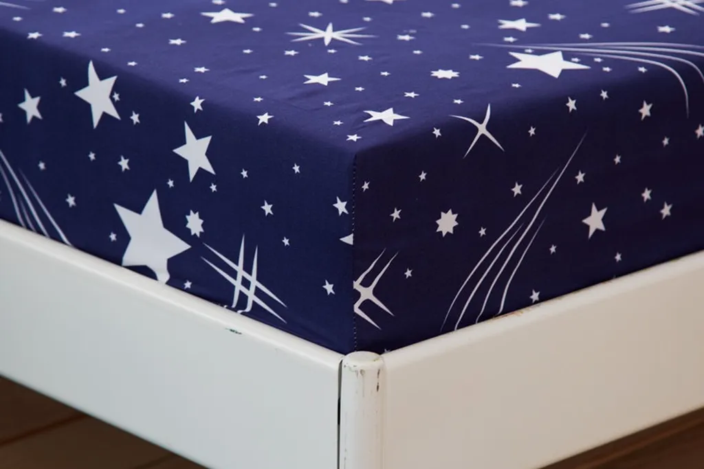 Light sheets with a small star and moon print.
