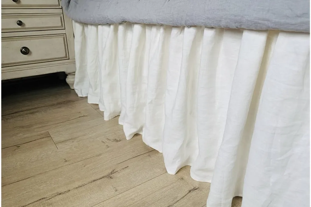 Fabric runner across a dresser with daily items on top.